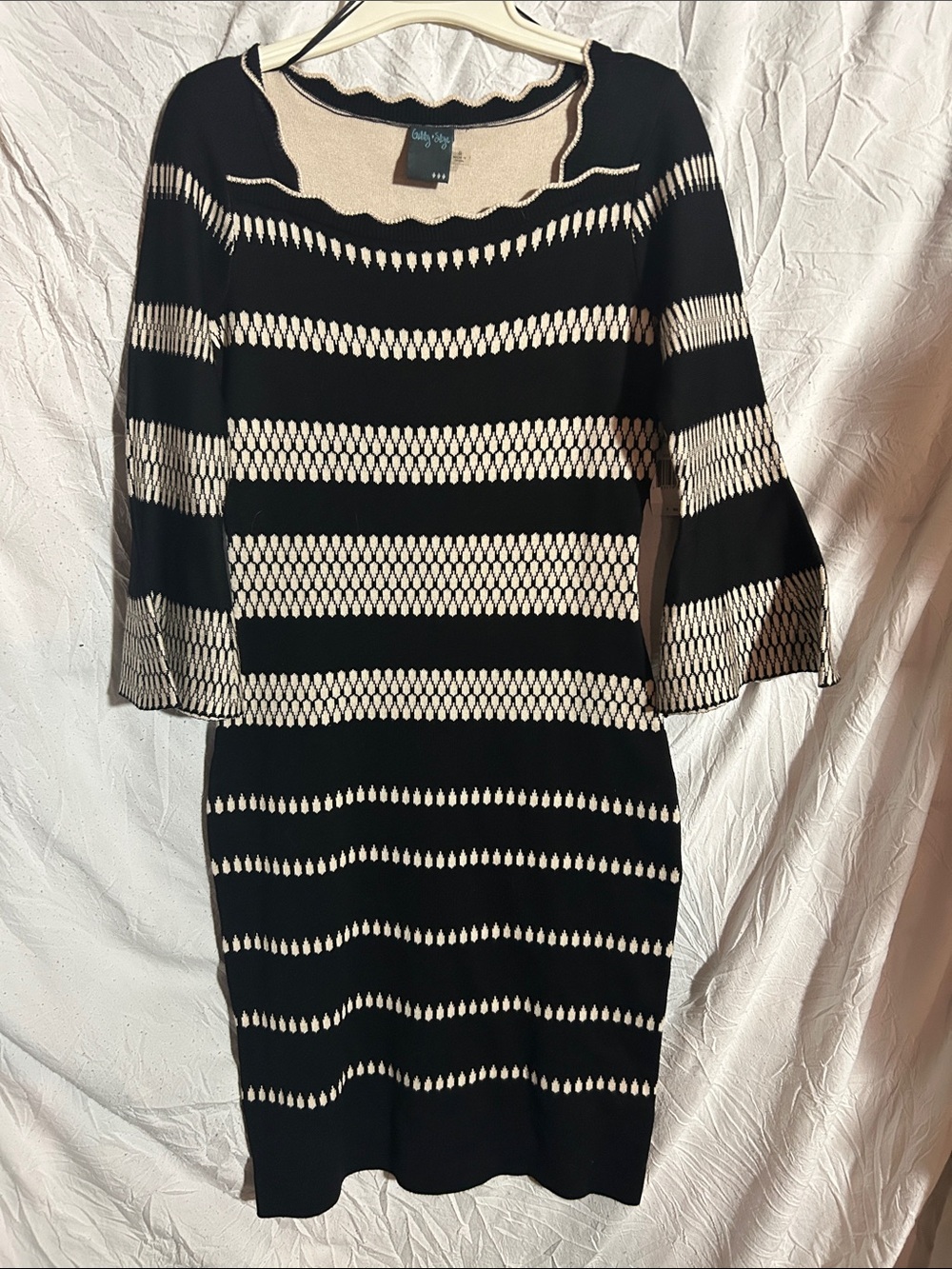 Gabby Skye Black and Cream Striped Long Sleeve Knit Dress size small NWT.